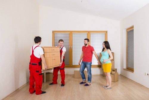 Professional movers from Sidcup loading a van