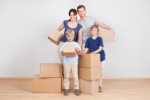 Professional movers loading a truck