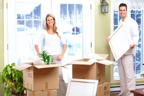 Professional movers packing items