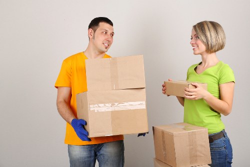 Professional movers loading a van in Greenwich