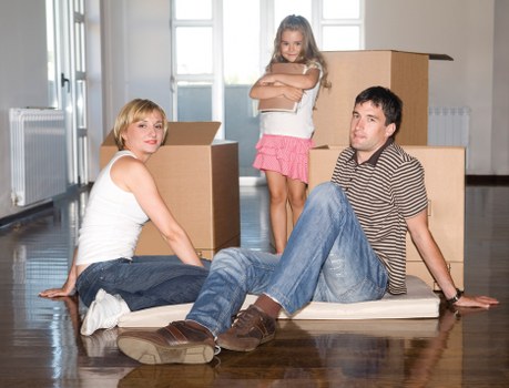 Professional movers from Man with Van Harringay handling furniture